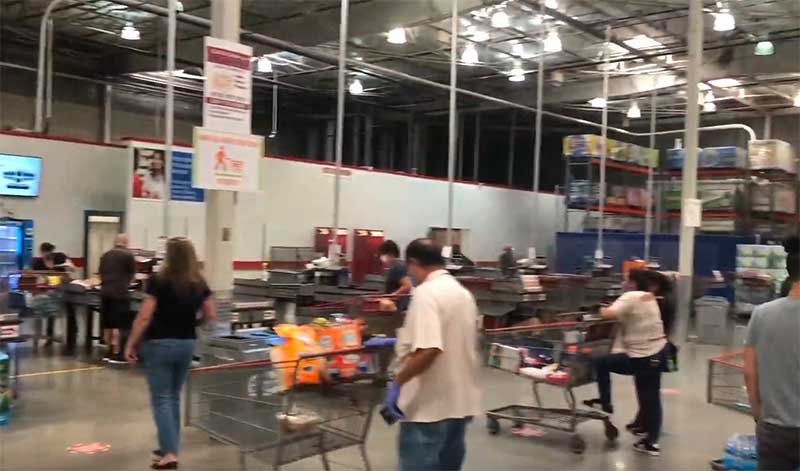 Jose Mier waiting in Costco checkout line in Sun Valley, CA