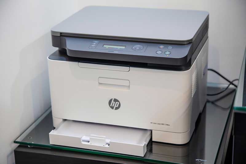 Jose Mier's office laser printer