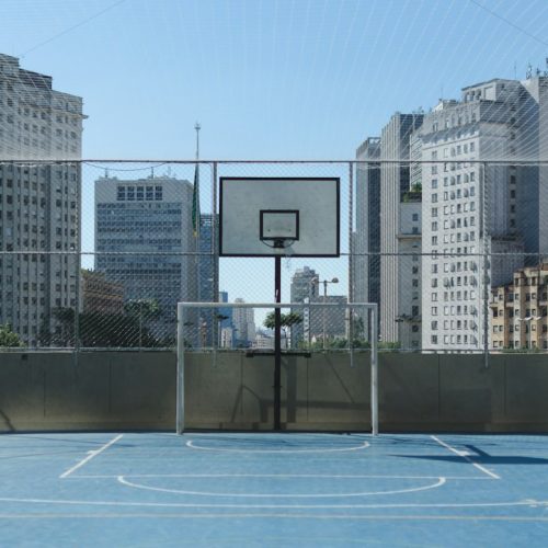 Basketball court with a view of the surrounding city